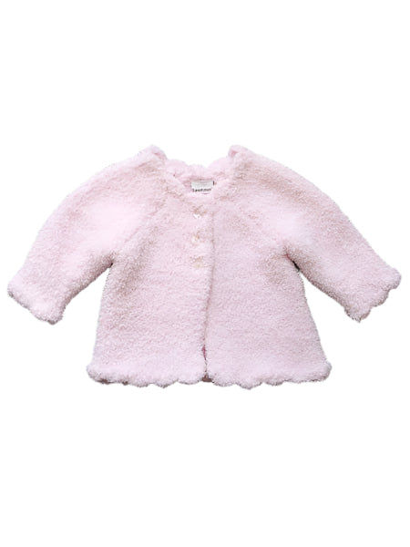 Light pink baby girls sweater. Scalloped edges.