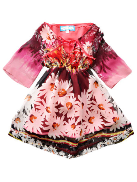 Bohemian style baby and toddler girls dress. Daisy print pattern of white, pink, and burgundy silk overlay with pink cotton underdress. Peasant style front tie at neckline, gather high waistline, and sheer wide sleeves.