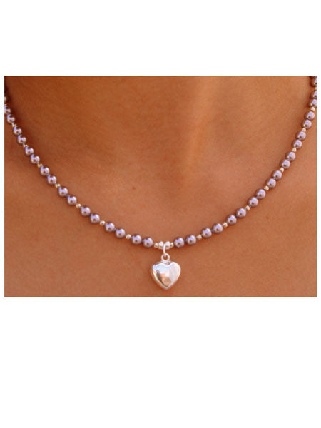 Lavender pearl beaded necklace with sterling silver heart drop and sterling silver accent beads.