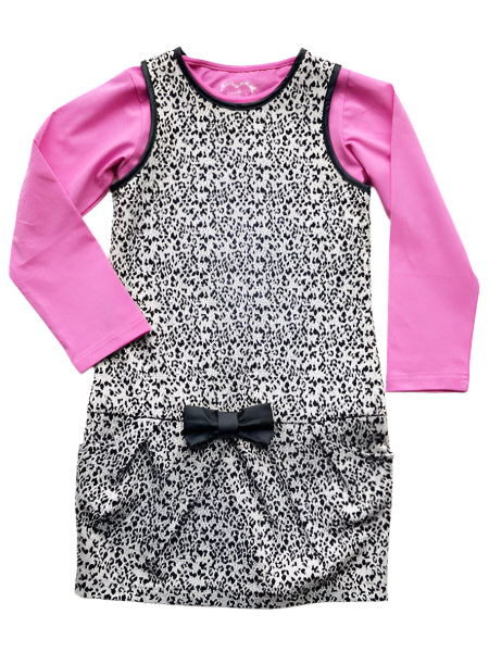 A two-piece outfit with a leopard print knit jumper dress and a pink tee shirt top, featuring front pockets and a black pleather accent bow.