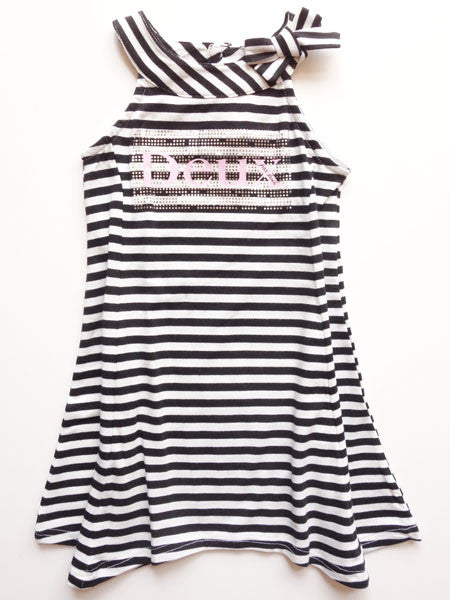 Swing style toddler girls dress, black and white stripe. Sleeveless with bow at one shoulder.