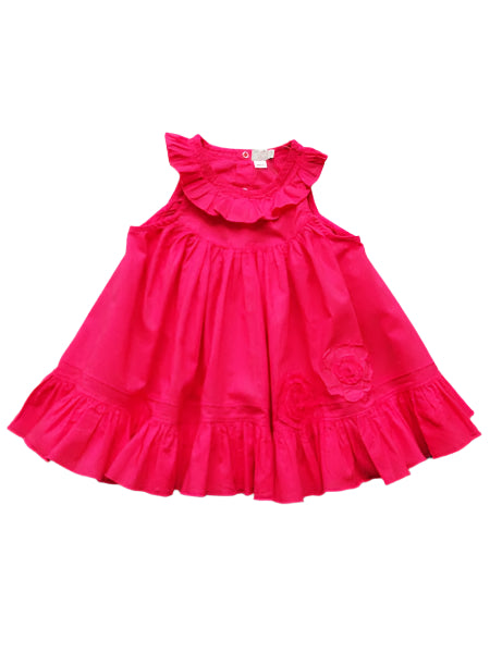 Fuchsia pink baby girls dress. Sleeveless with ruffled collar and hem.