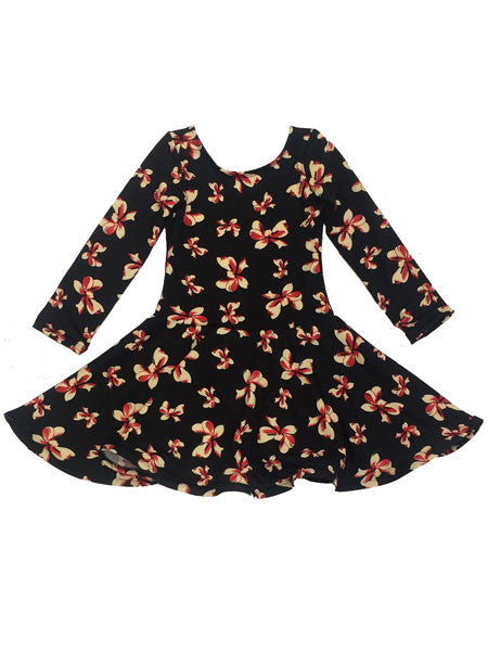 Log sleeve knit dress, round neckline. Red and white bow print on black.