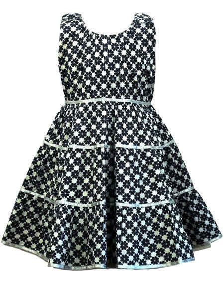 Slate gray and white abstract clover print dress. Tiered. Metallic ribbon and thread accents. Sleeveless.
