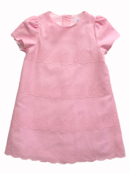 Pink linen baby and toddler girls dress by Luli & Me. Short puffed sleeves and scalloped lace tiered stripes and hem.
