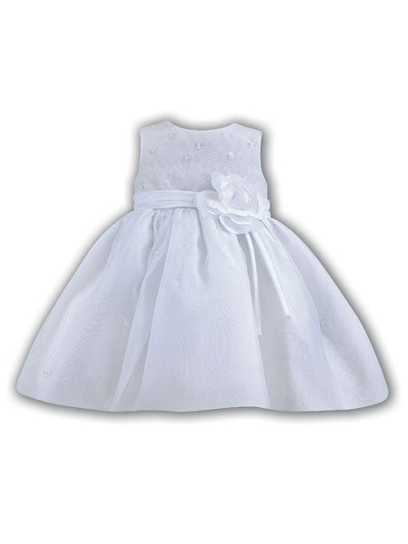 Toddler girl's white organza dress with sequin embellishments and a bow detail at the waist.