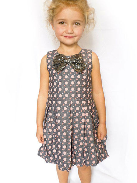 Sleeveless gray cotton chambray party dress with pink dots and silver sequin bow.