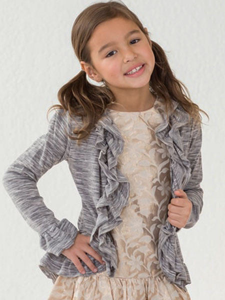 Little girl wearing long sleeve, high low cardigan sweater for little girls by Sophie Catalou. Heathered gray and  ivory. Ruffles along edges and sleeve cuffs.