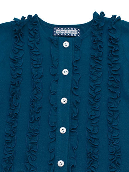 Detail image of teal blue cardigan sweater for little girls. Gathered ruffles along front placket. Slight gathering at cuffs. White buttons.