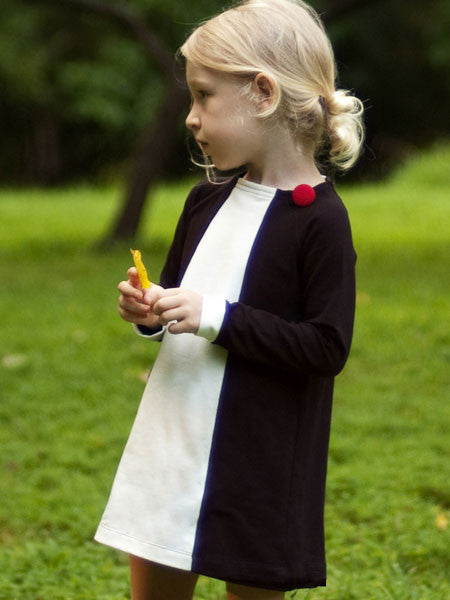 Black with white ivory dress. Long sleeves with white contrast cuff.