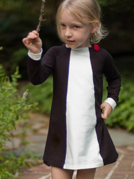 Black with white ivory dress. Long sleeves with white contrast cuff.