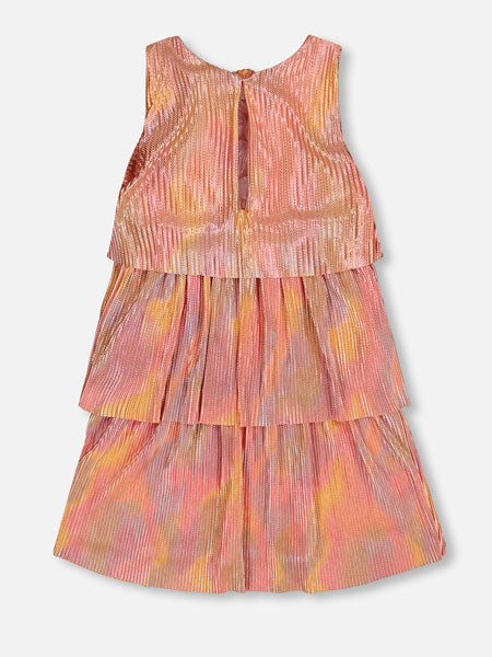 Back view of  a metallic rainbow print pleated party dress. Features a sleeveless bodice with wide straps, a round neckline, and three separate tiers. By Deux Par Deux.