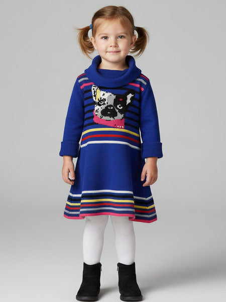 Young girl wearing a colorful dress with a dog design on a plain background