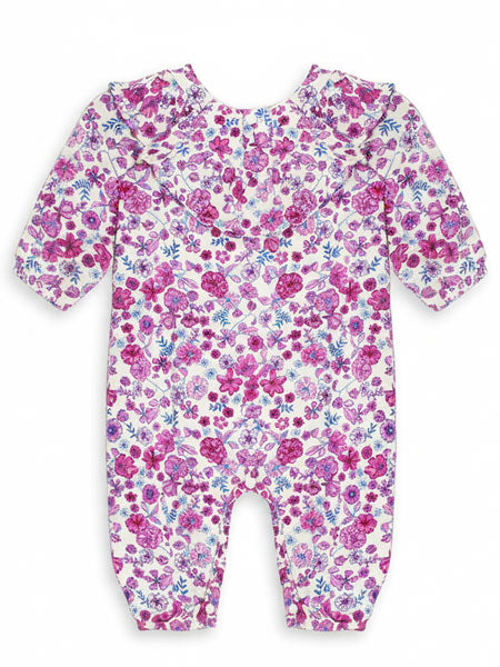 Floral patterned baby onesie on a white background