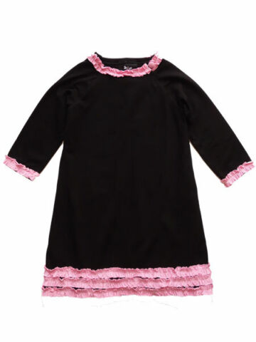 Black jersey knit dress. Pink ruffle trim on collar, sleeves, and hem line.