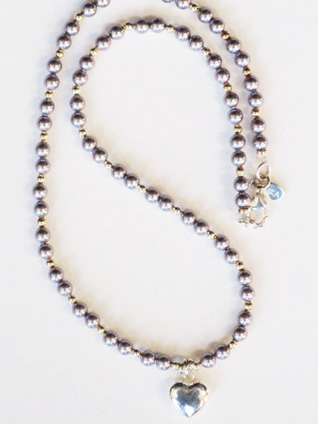 Lavender pearl beaded necklace with sterling silver heart drop and sterling silver accent beads.