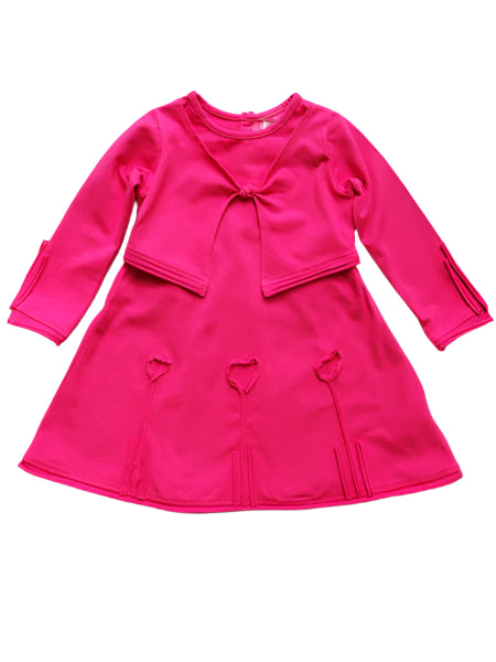 Fuchsia pink baby girls jersey dress. Long sleeves with attached vest overlay. Heart accents. A-line style.