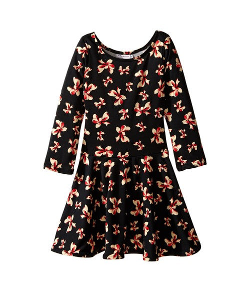 Log sleeve knit dress, round neckline. Red and white bow print on black.