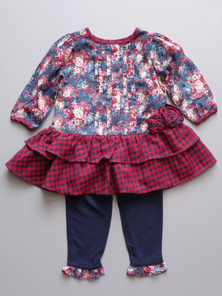 Back view of navy floral baby dress. Long sleeves. Drop waist style.