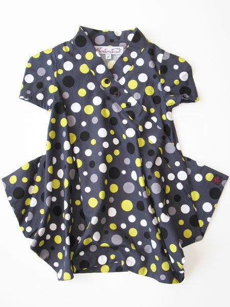 Modern retro styling dot print dress by Kidcuteture. Charcoal with gray, white, yellow and black dots. Short sleeves. Handkerchief hem.