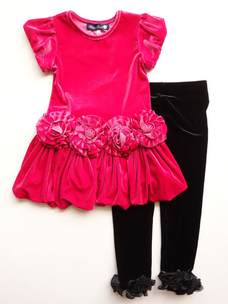 Fuschia pink velvet velour girls party dress by Mulberribush. Short sleeves. Drop waist with rosette trim, gathered skirt. Shown with black velvet leggings.